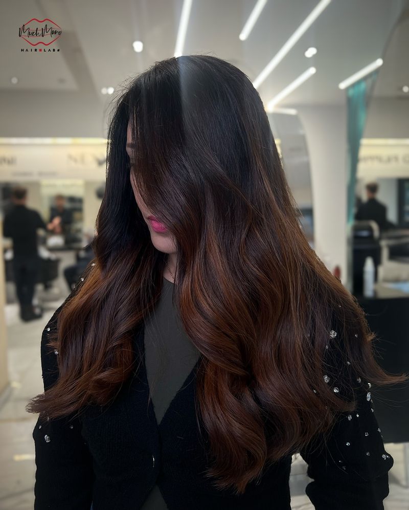 5. Deep Mahogany Waves with Side-Swept Bangs