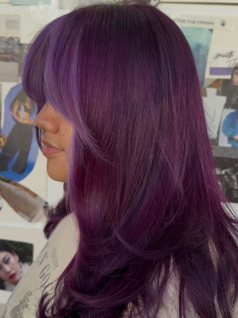 4. Deep Plum Layers with Curtain Bangs