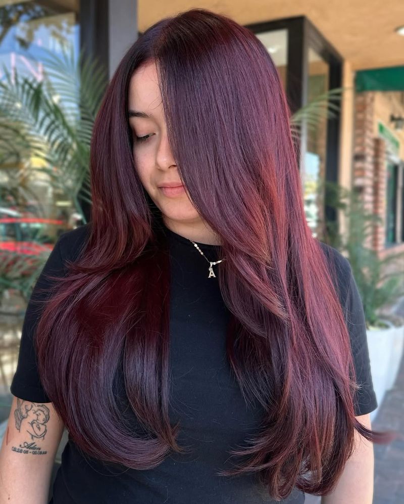 45. Deep Plum Long Layers with Soft Face-Framing