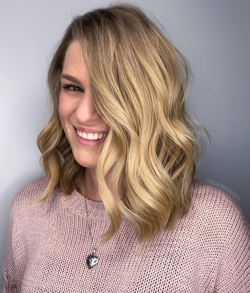 9. Deep Side Part Honey Lob