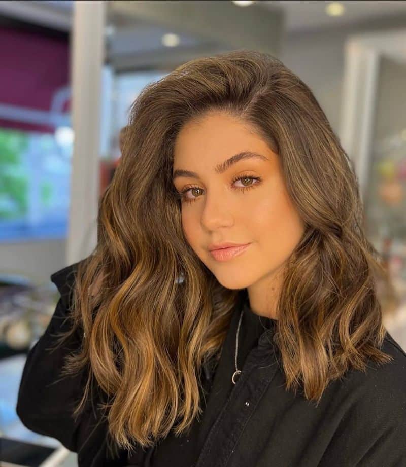 45. Deep Side Part Wavy Lob