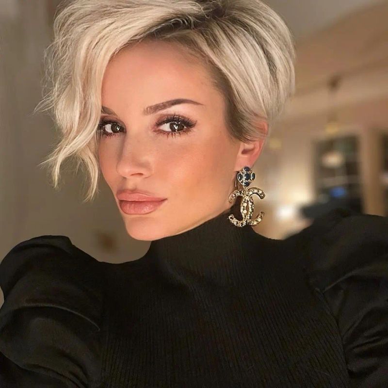 5. Deep Side Part with Asymmetrical Platinum Fringe