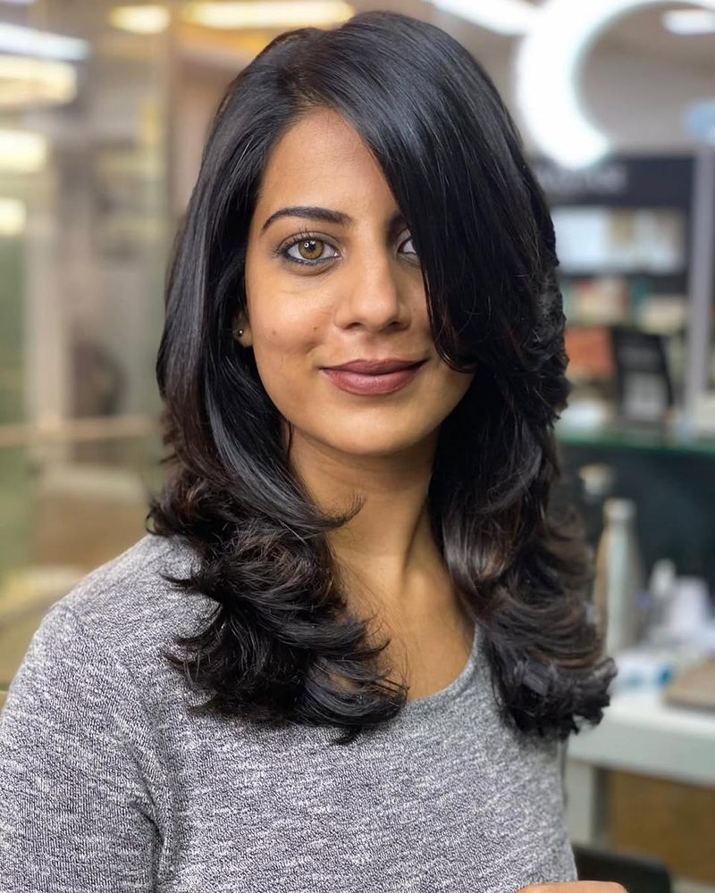 26. Deep Side Part with Layered Ends