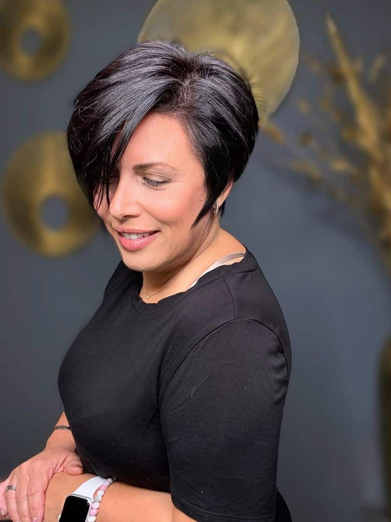29. Deep Side-Parted Pixie Bob