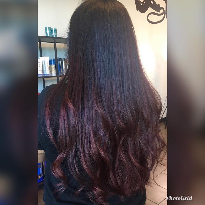 7. Deep Wine Balayage on Long Waves