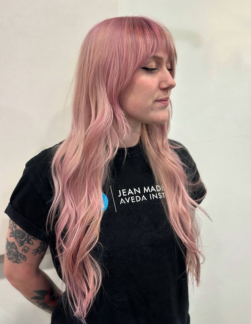 9. Dusty Rose Long Layers with Piecey Bangs