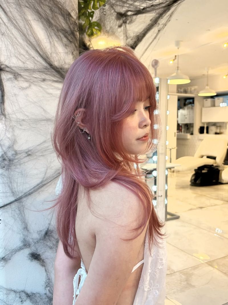 19. Dusty Rose Shag with Curtain Bangs