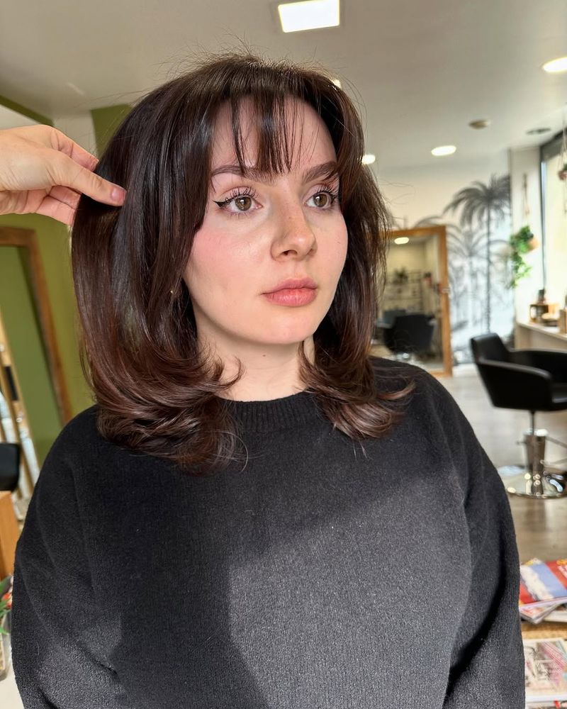 43. Espresso Feathered Lob with Wispy Bangs