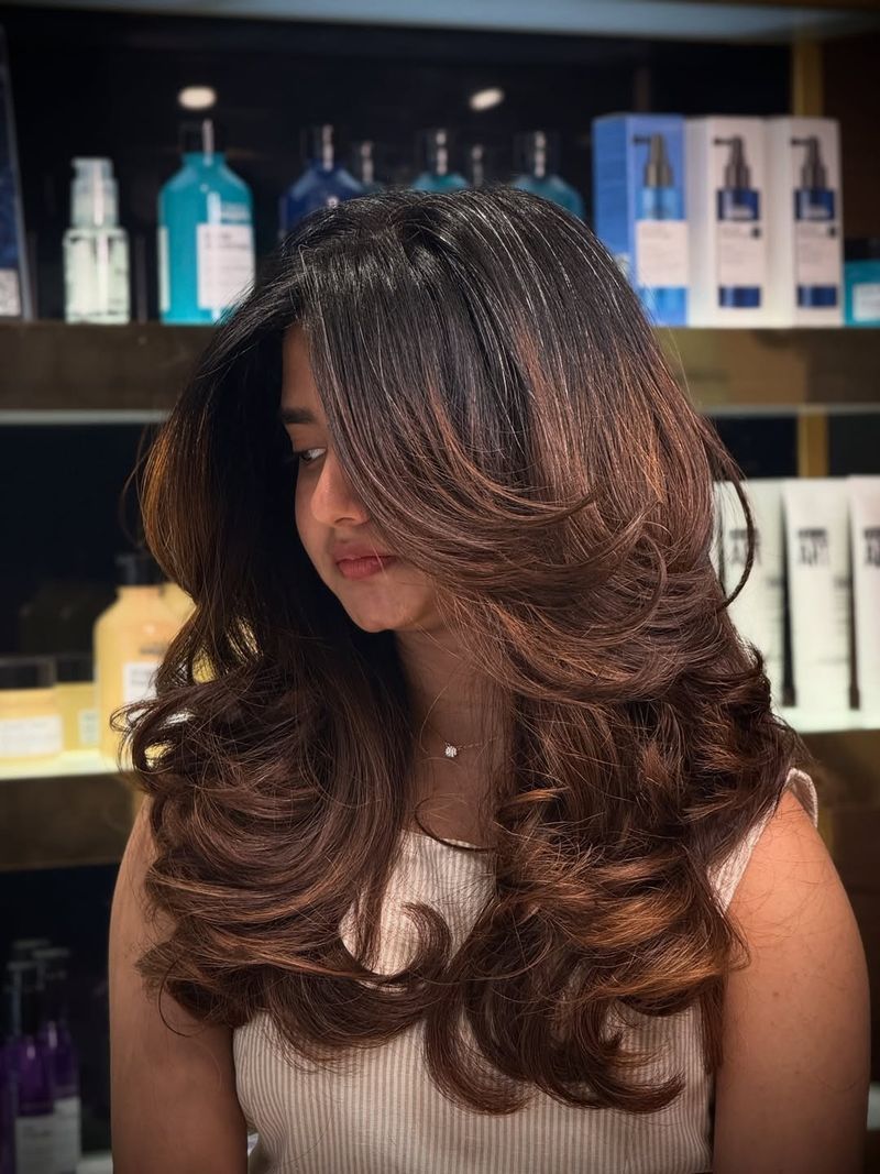 10. Espresso Layers with Sweeping Side Bangs