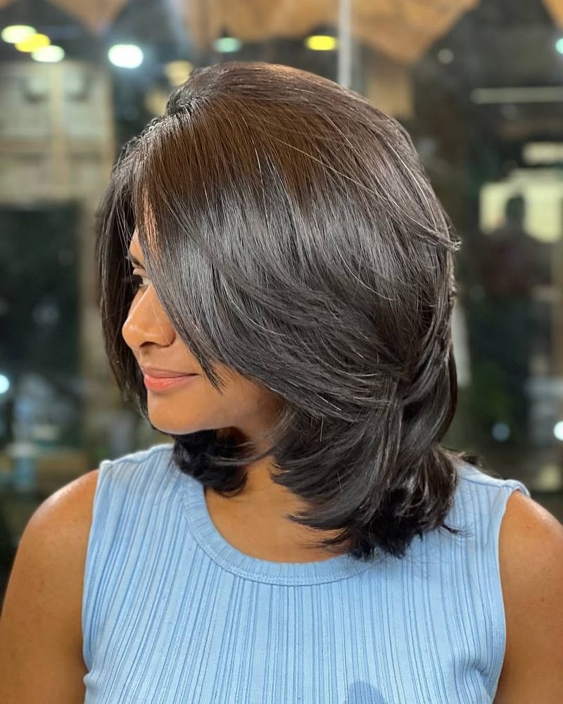 34. Feathered Brunette Layered Bob