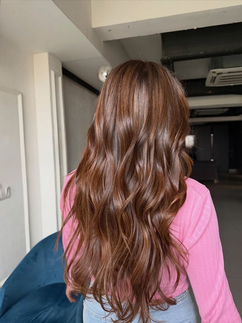 32. Glossy Caramel Highlights on Chestnut Base