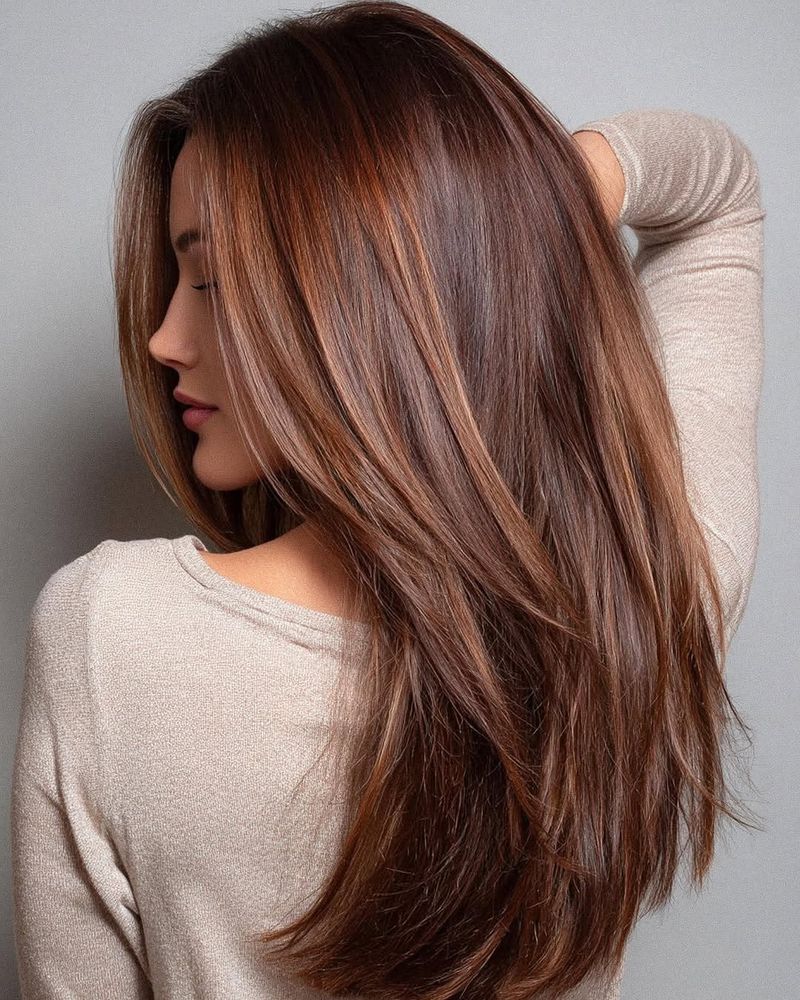 40. Glossy Chestnut Layers with Caramel Highlights