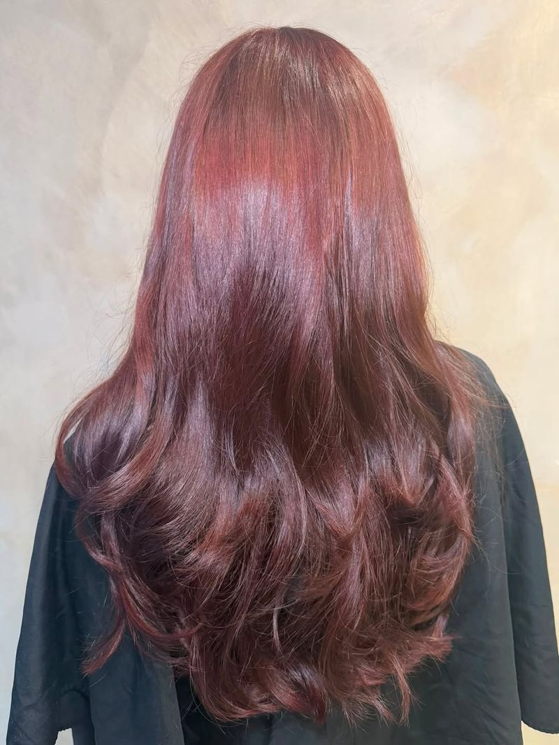 13. Glossy Long Layers with Soft Curls