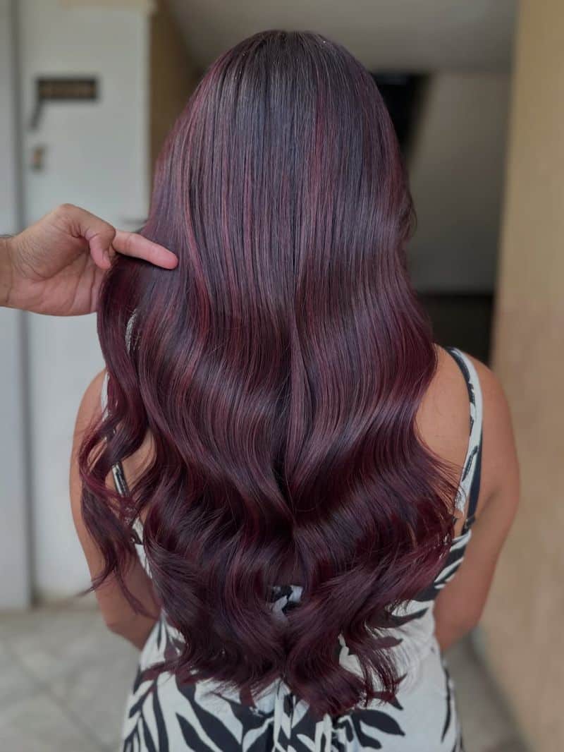 42. Glossy Maroon Waves with Subtle Highlights
