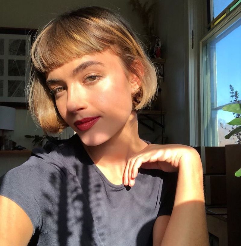 31. Golden Brown Micro Bangs and Subtle Taper