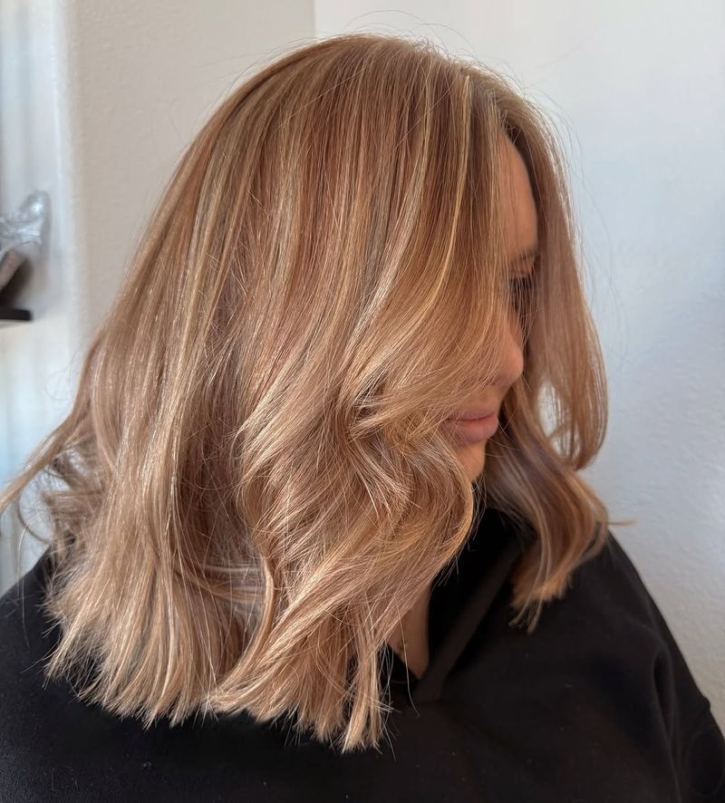 16. Honey Apricot Lob with Face-Framing Highlights