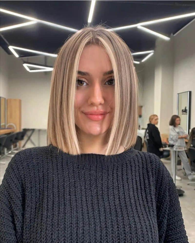10. Honey Blonde Highlights with Face-Framing Money Pieces