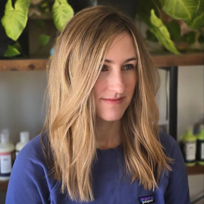 23. Honey Blonde Shoulder-Length Layers