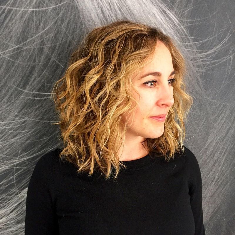 46. Honey Blonde Wavy Lob with Side Part