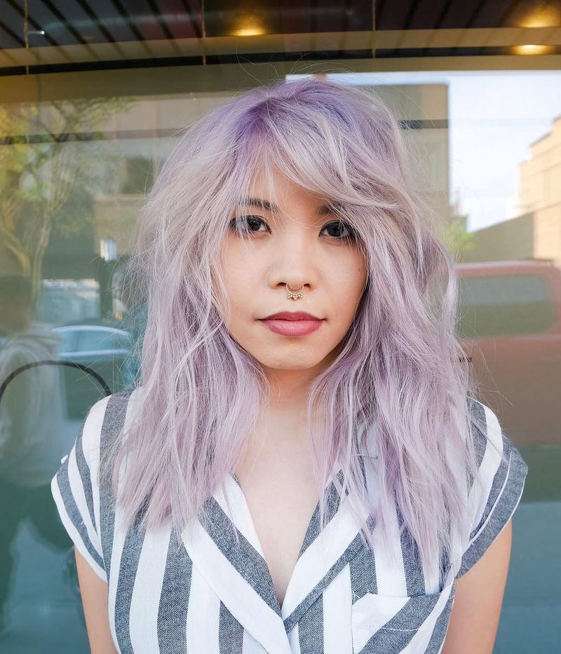 50. Icy Lilac Shag with Side-Swept Bangs
