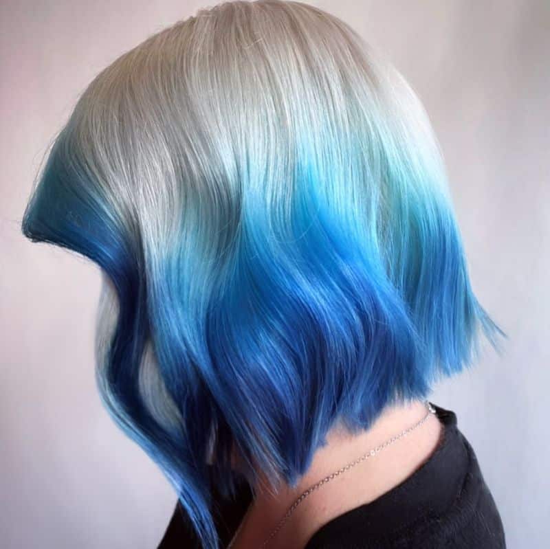 27. Icy Platinum to Electric Blue Dip Dye Bob