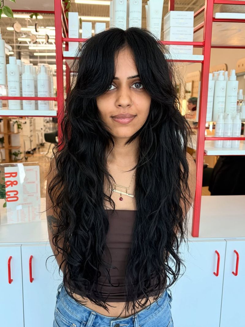 20. Jet-Black Shag with Curtain Bangs