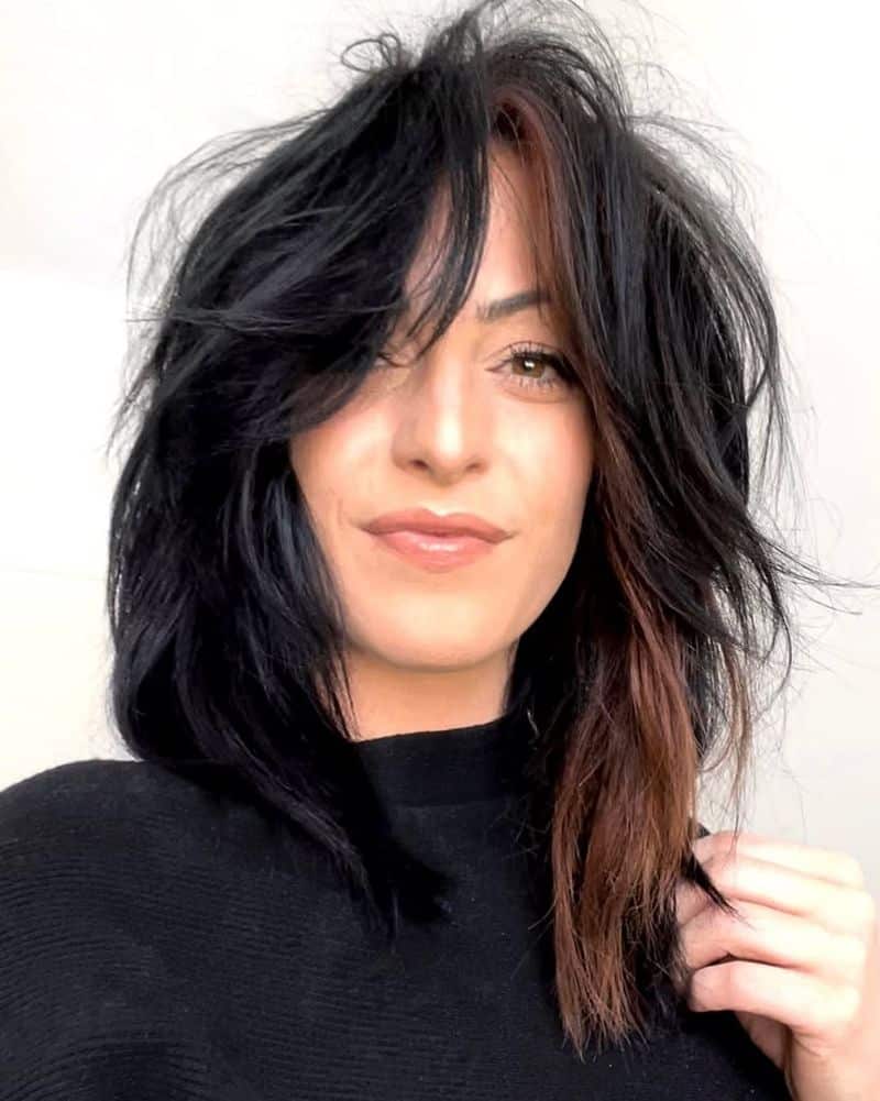 34. Jet Black Shag with Hidden Auburn Face-Framing Pieces