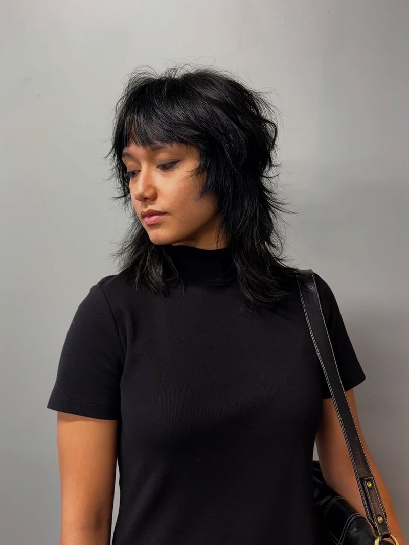 13. Jet Black Shaggy Wolf with Piecey Bangs