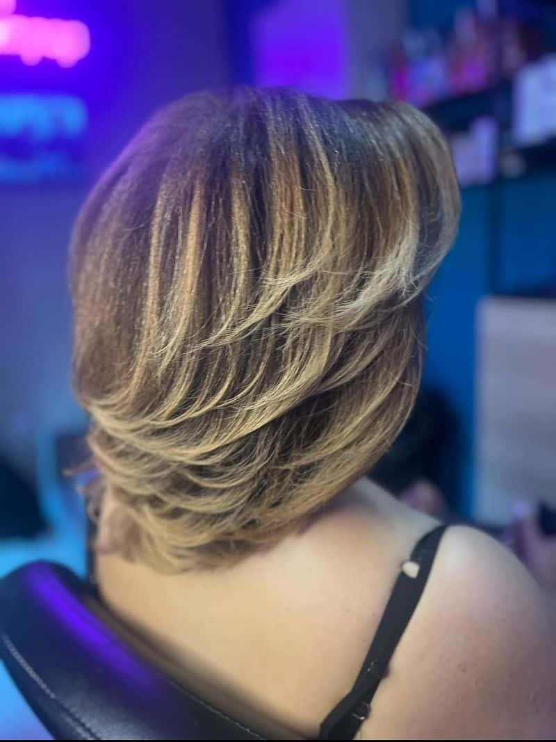 22. Layered Amber Feathered Bob