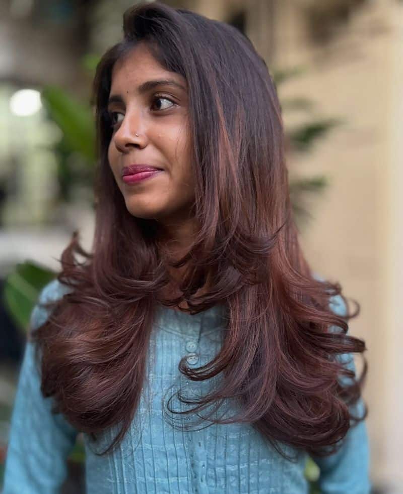 35. Layered Blowout with Deep Burgundy Tones