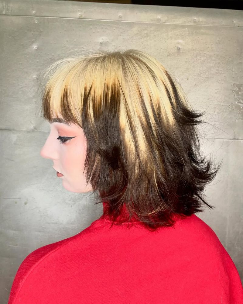35. Layered Shag with Blonde Crown and Dark Underlayer