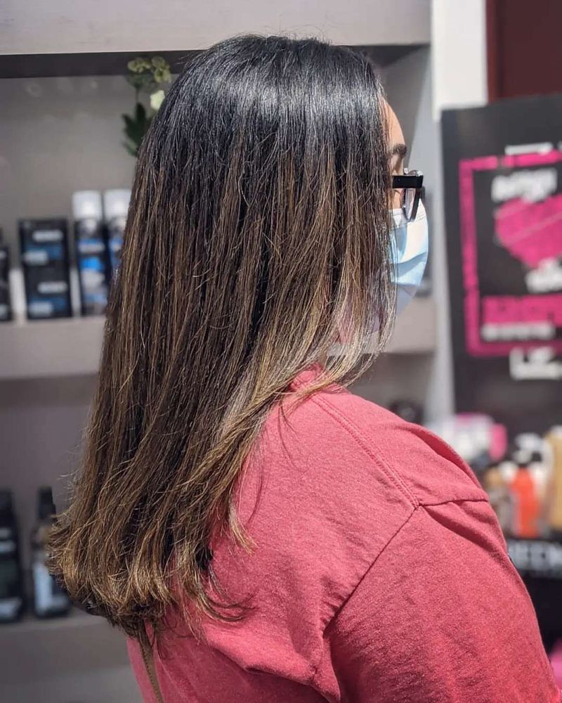 20. Long Dark Layers with Caramel Highlights