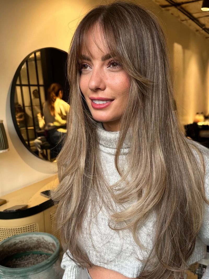 20. Long Layered Blowout with Feathered Fringe