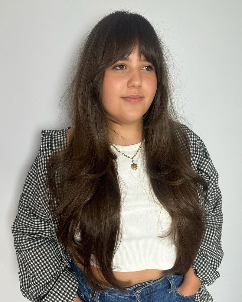 30. Long Layers with Blended Birkin Fringe