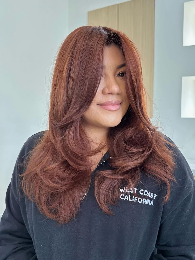 27. Long Layers with Soft Curtain Bangs