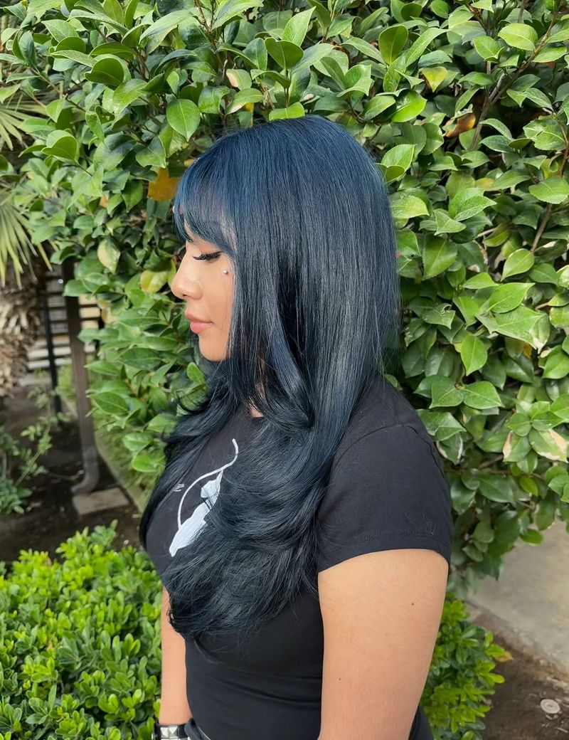 23. Long Layers with Wispy Bangs