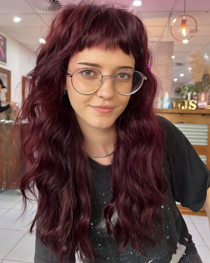 14. Messy Shag with Baby Bangs