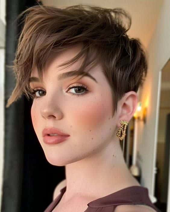 52. Messy Side-Swept Pixie with Long Bangs