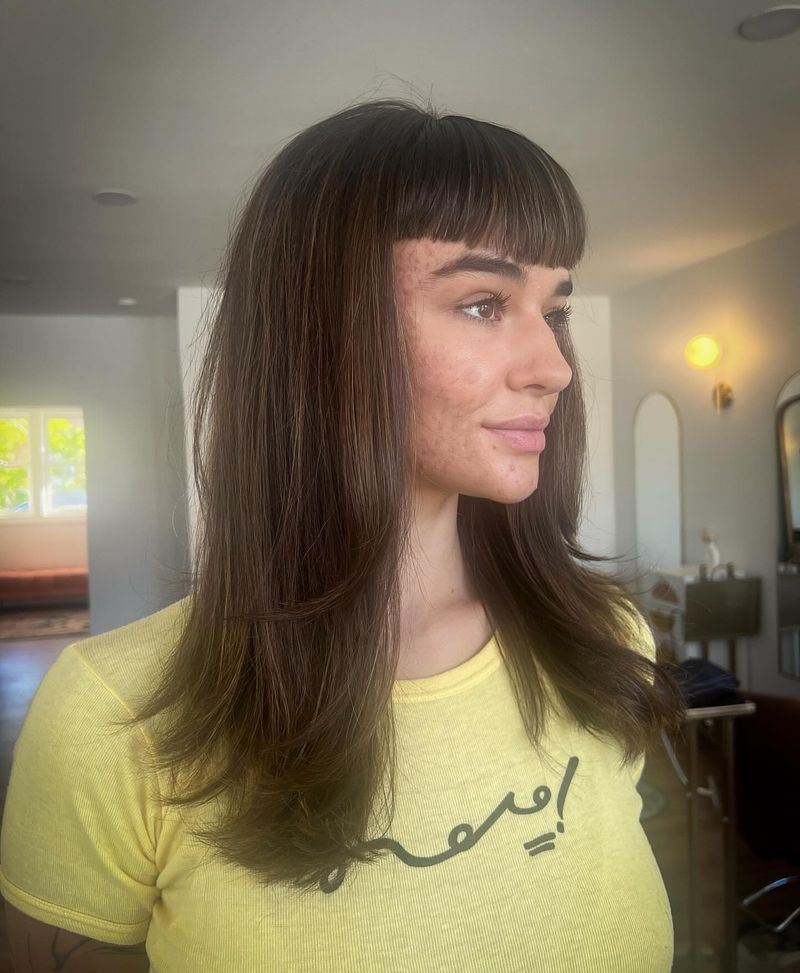 2. Micro Bangs with Long Layers