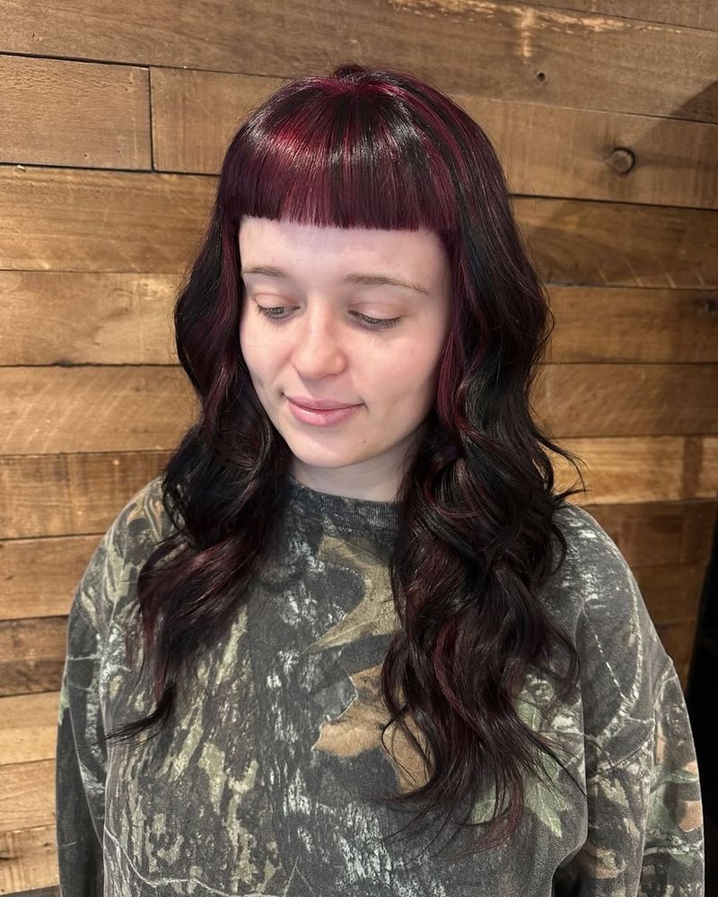 5. Micro Bangs with Plum Highlights