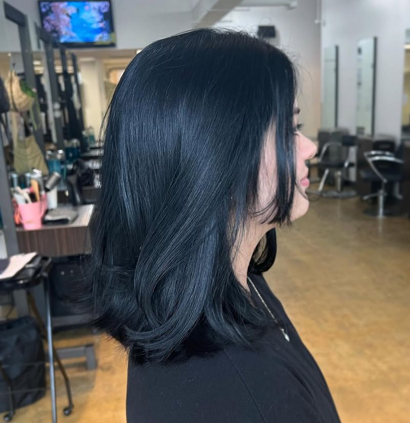 17. Midnight Blue Lob with Face-Framing Layers