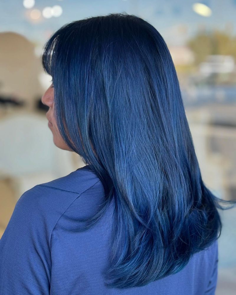 28. Midnight Blue Waves with Soft Bangs