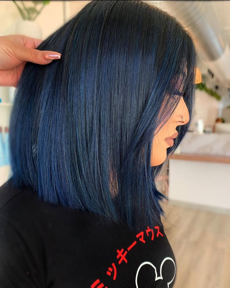 5. Midnight Ink Lob with Face-Framing Strands