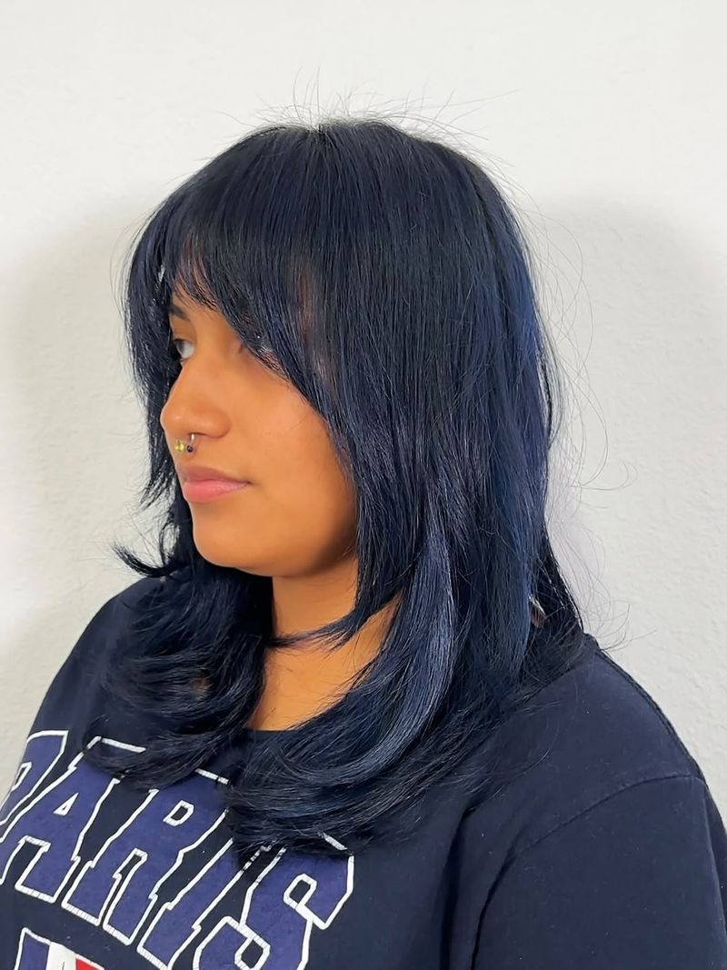 31. Midnight Shag with Face-Framing Fringe