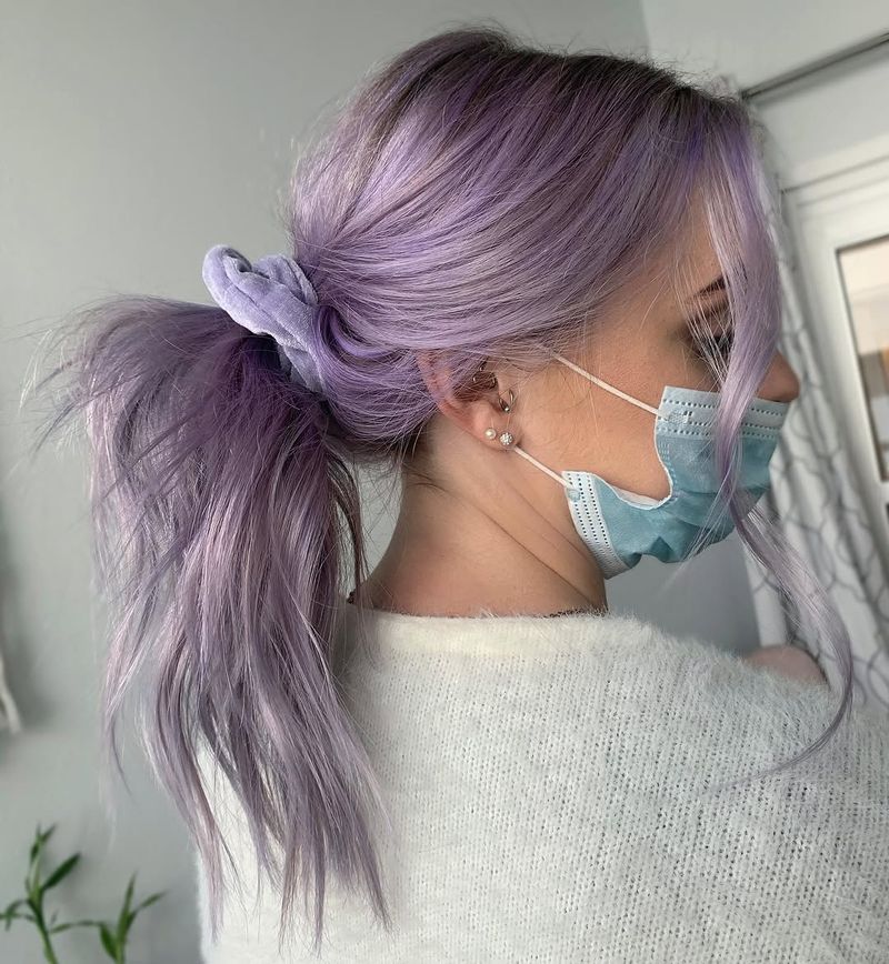 15. Pastel Purple Ponytail with Face-Framing Pieces