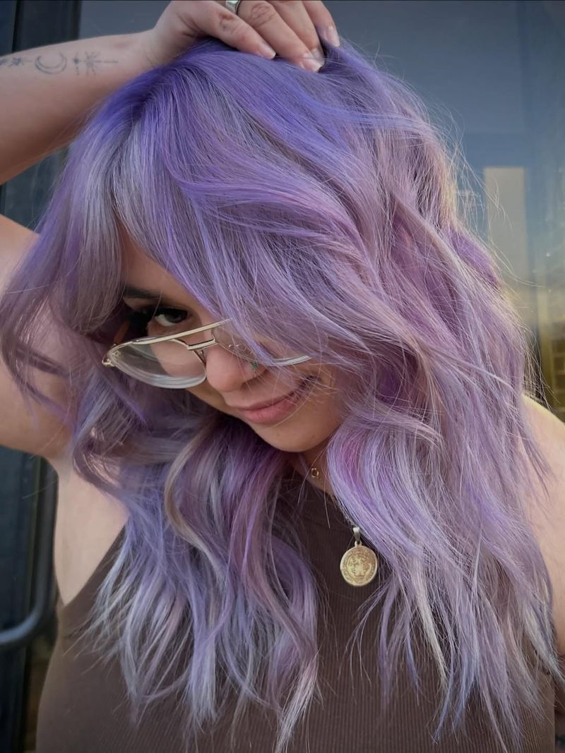 46. Pastel Violet Shag with Face-Framing Fringe