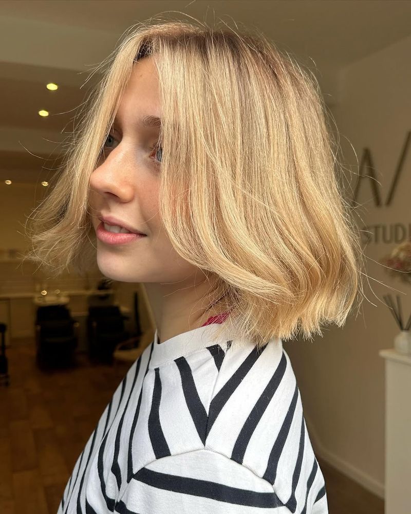 40. Peachy Amber Curtain Bob