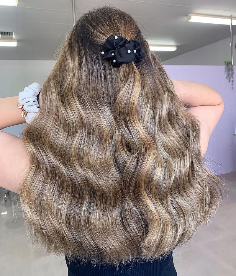13. Pearl-Accented Half-Up Waves