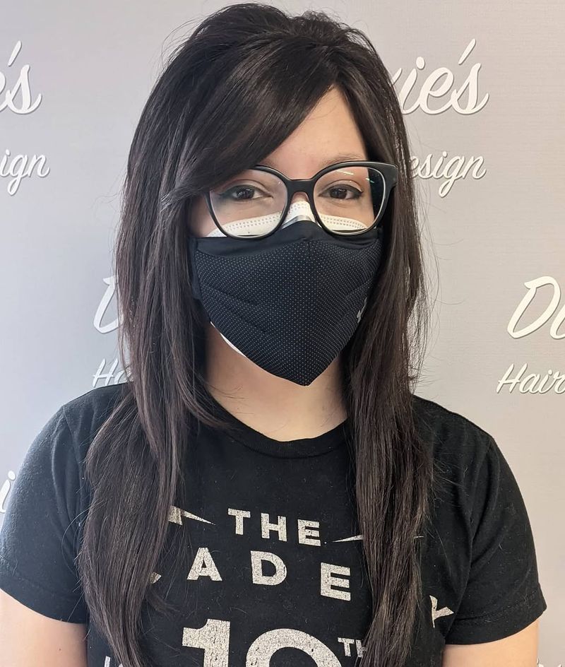 21. Piece-y Dark Layers with Side Bangs