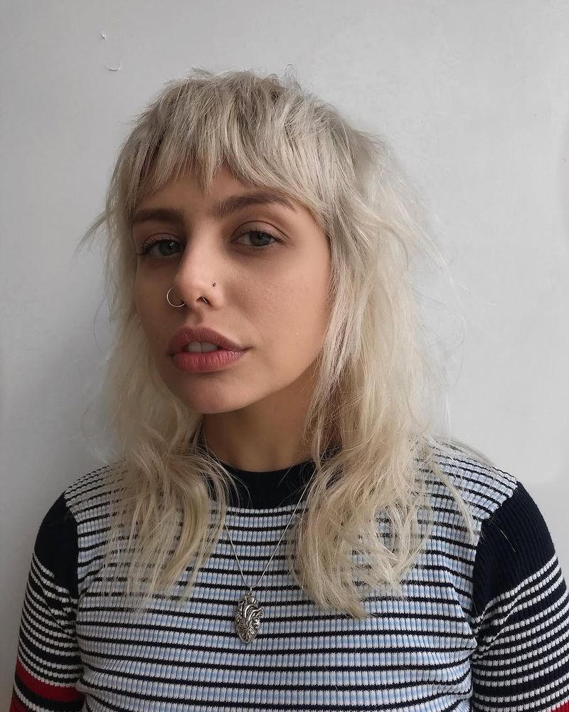 37. Platinum Bleached Shag with Heavy Micro Bangs